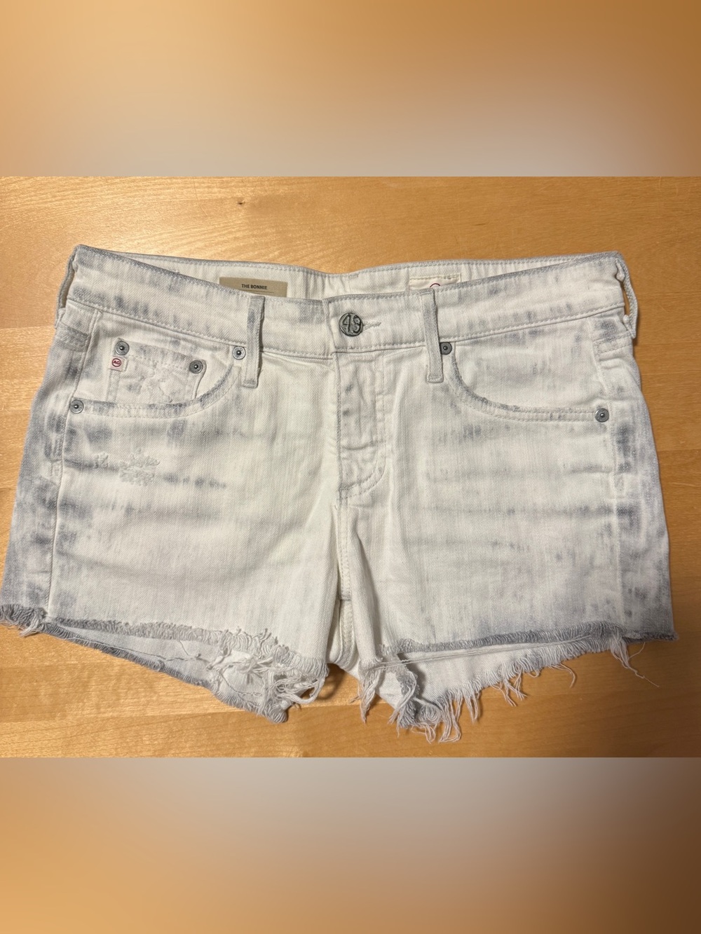 Ag The Bonnie low rise distressed acid wash denim shorts